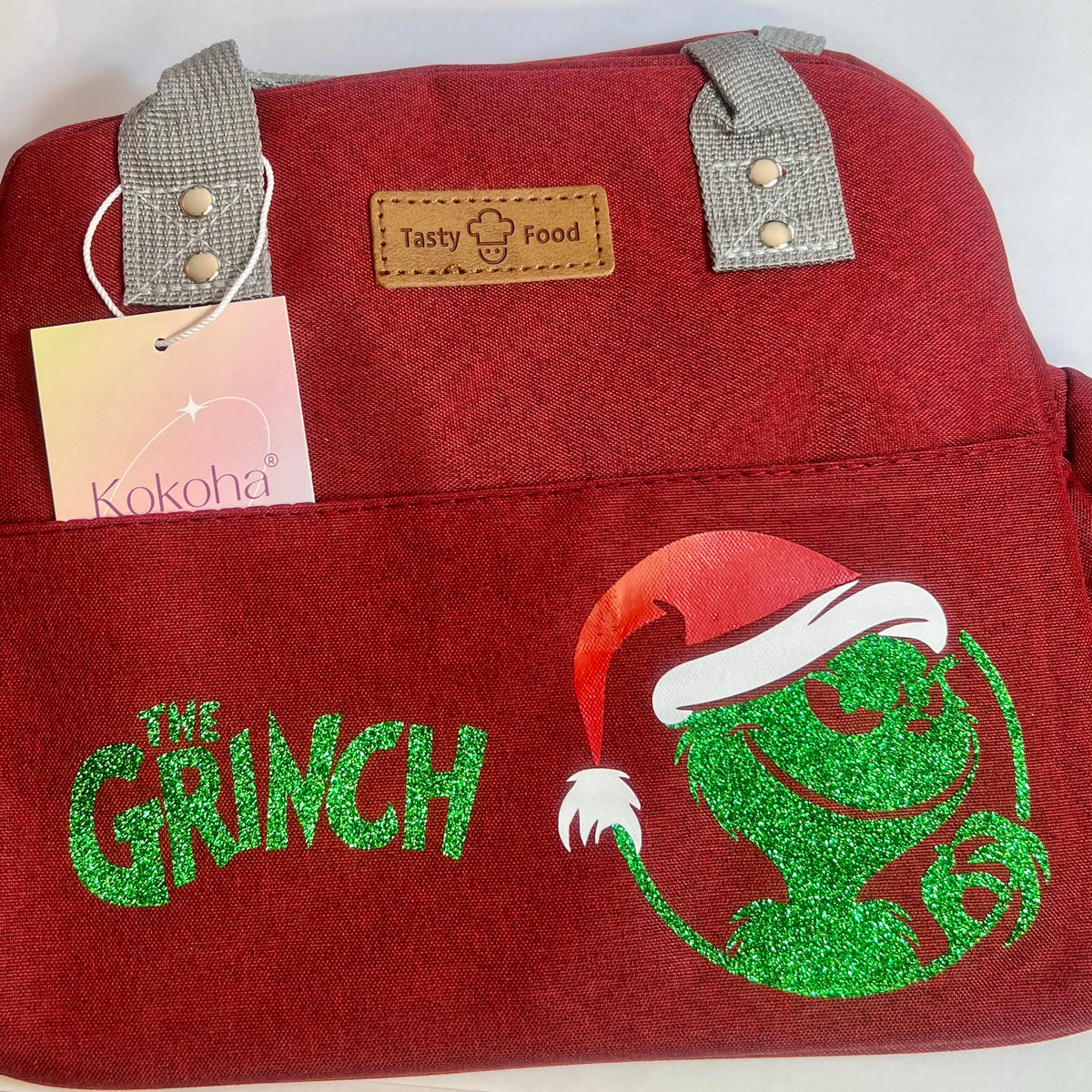 Lunch bag isotherme bordeaux personnalisé avec motif du Grinch vert pailleté et poignées grises – Kokoha