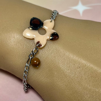 Bracelet Moana – Fleur léopard en pâte polymère, perle d'oeil de tigre et chaîne inoxydable ajustable
