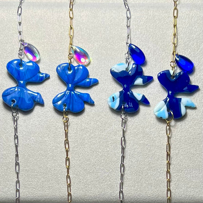 Bracelets Nolia – Nœud en pâte polymère et acier inoxydable